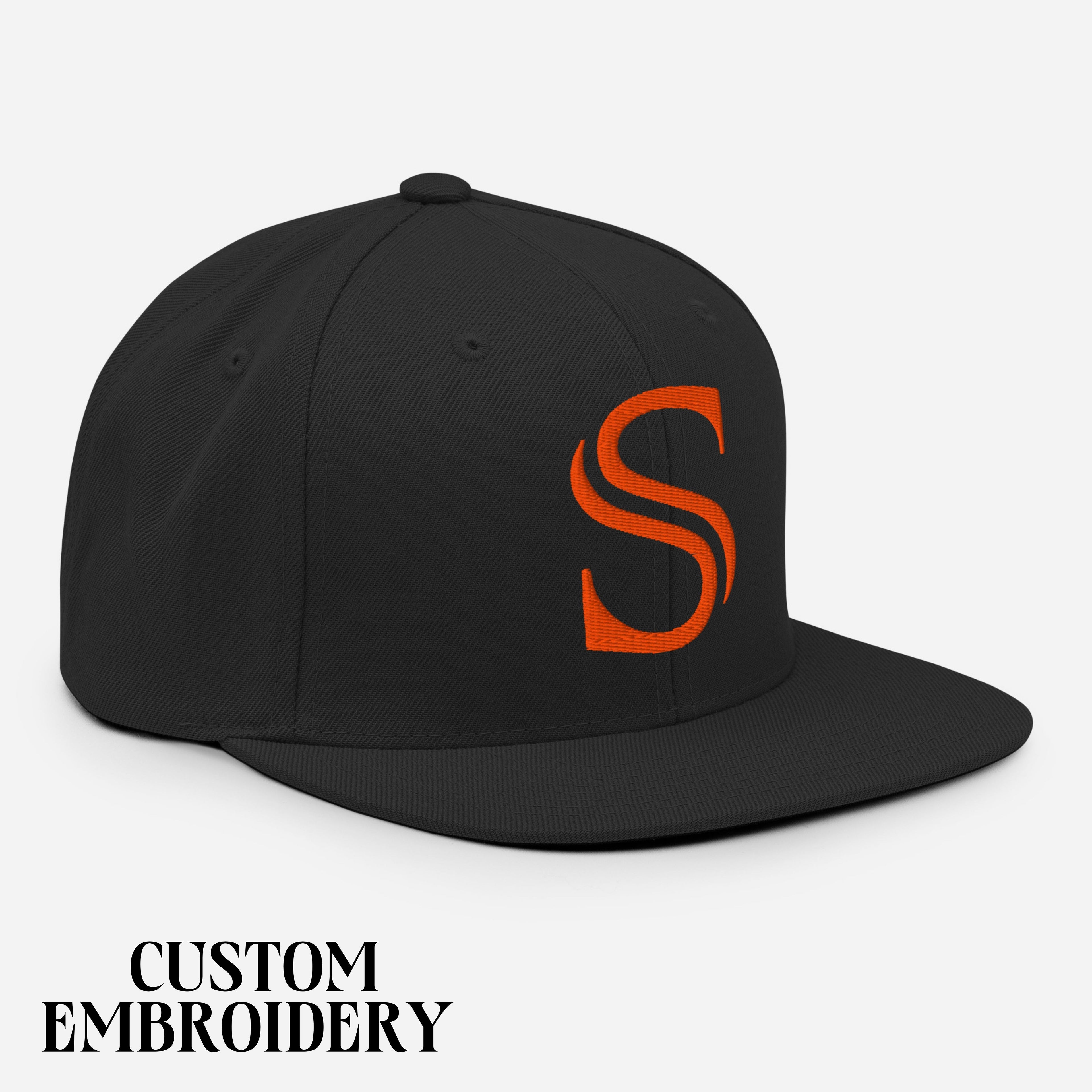 Black snapback hat with orange embroidered S logo, custom sports parent apparel