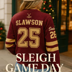 Woman wearing maroon varsity sweater with gold Slawson 25, outside near Christmas decor
