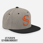 Gray and black snapback hat with orange embroidered S, custom embroidery sports cap