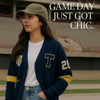 Woman in varsity cardigan and baseball cap at stadium, chic sports parent apparel style