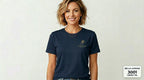 Woman wearing a navy blue t-shirt with a logo on a light gray background