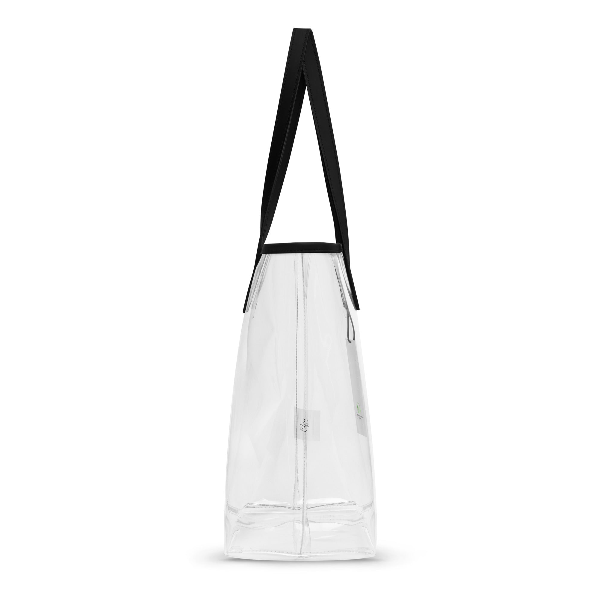 Clear tote bag with black straps on a white background