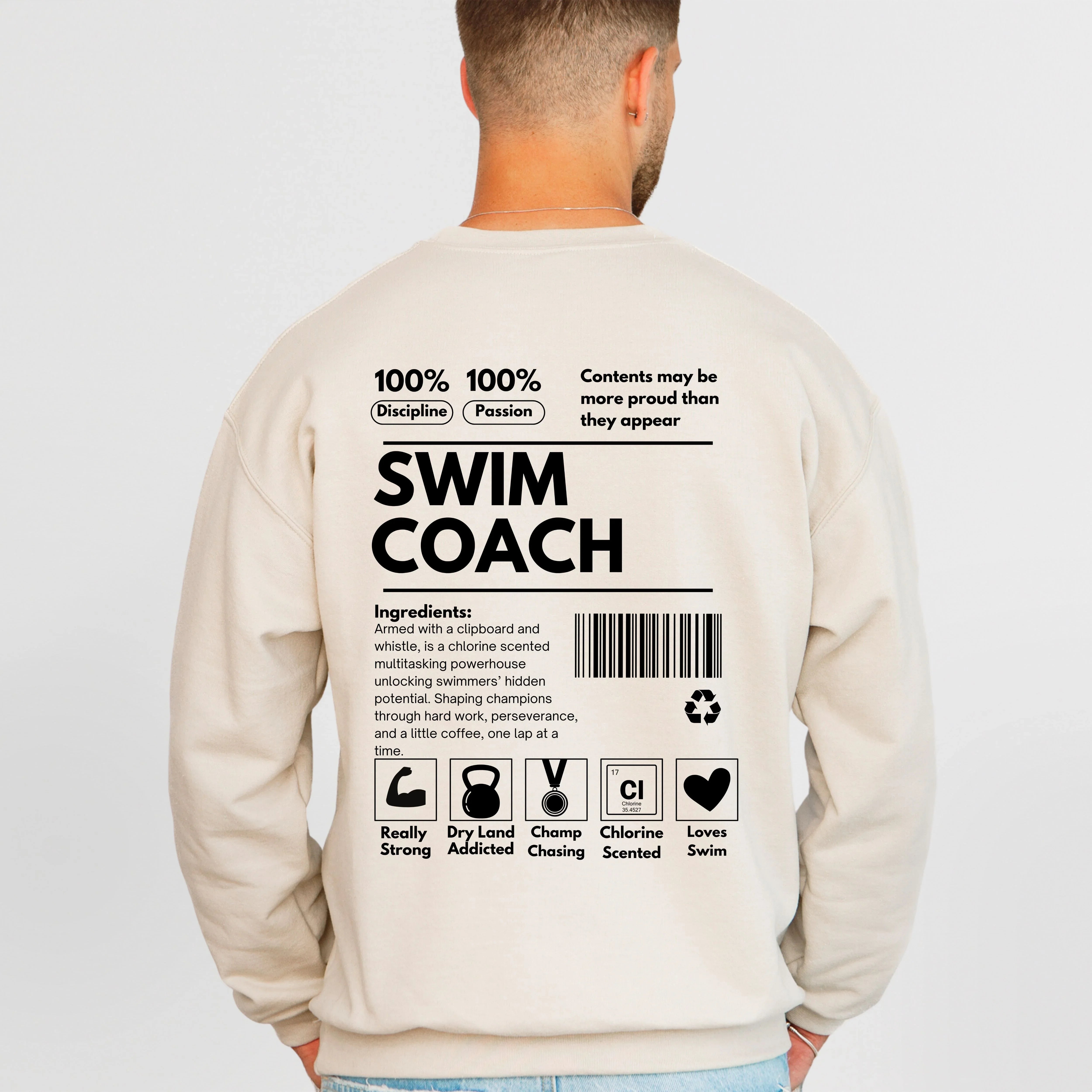 Beige sweatshirt with text on the back, worn by a person, on a light gray background